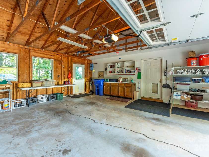 4 Galax Lane, Black Mountain, NC 28711.  MLS# CAR4286030, YatesRealty ID 29947. Main level oversized 2 car garage.