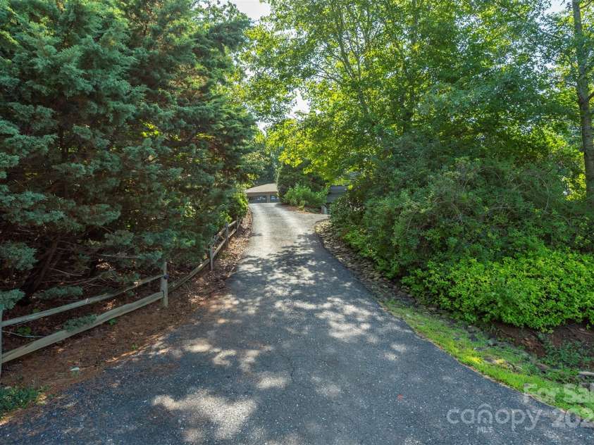 4 Galax Lane, Black Mountain, NC 28711.  MLS# CAR4286030, YatesRealty ID 29947. Private driveway to 4 Galax Lane