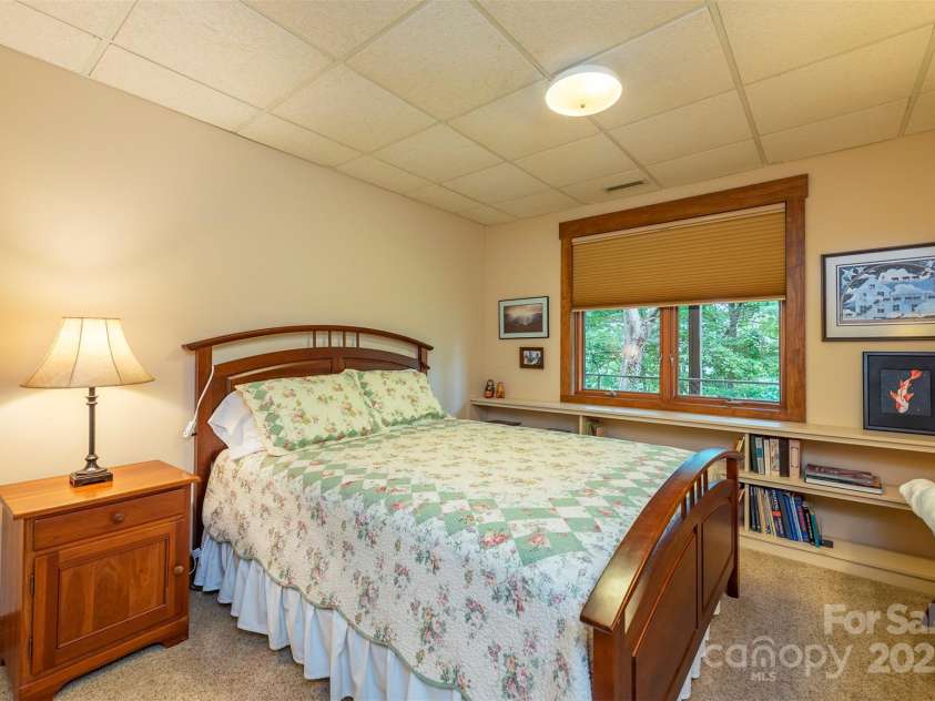 4 Galax Lane, Black Mountain, NC 28711.  MLS# CAR4286030, YatesRealty ID 29947. Second bedroom in lower level