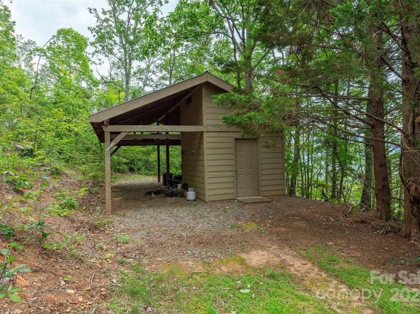 4 Galax Lane, Black Mountain, NC 28711.  MLS# CAR4286030, YatesRealty ID 29947. Shed/carport, tucked away w/level driveway