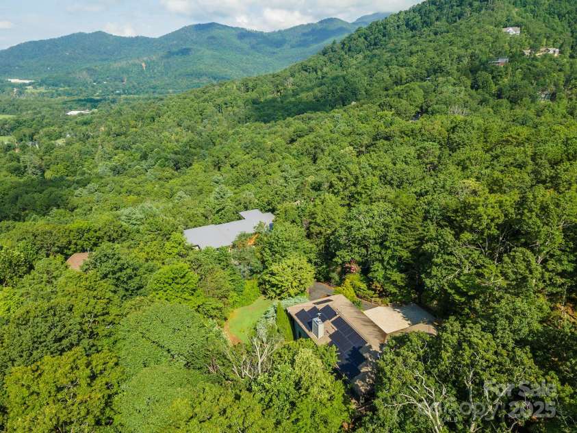 4 Galax Lane, Black Mountain, NC 28711.  MLS# CAR4286030, YatesRealty ID 29947. South/westerly aerial views from property.