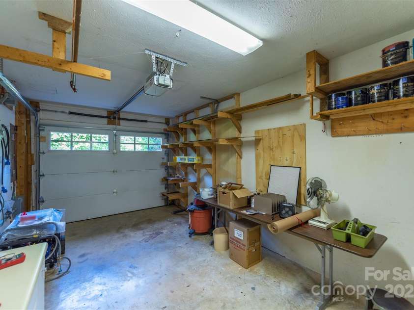 4 Galax Lane, Black Mountain, NC 28711.  MLS# CAR4286030, YatesRealty ID 29947. Workshop in lower garage