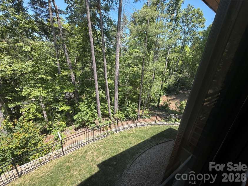 42 Spring Cove Road, Asheville, NC 28804.  MLS# CAR4246585, YatesRealty ID 29948. You'll feel like you're living in a treehouse as the trees and nature can be viewed from every window!!