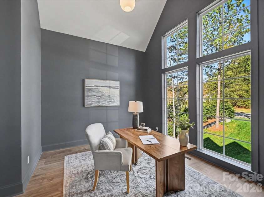 4609 Firethorn Court, Denver, NC 28037.  MLS# CAR4358984, YatesRealty ID 29951. Private home office with soaring ceilings and oversized windows, offering abundant natural light and an inspiring workspace.
