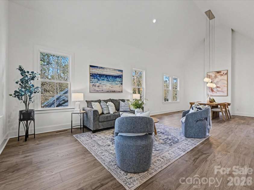 4609 Firethorn Court, Denver, NC 28037.  MLS# CAR4358984, YatesRealty ID 29951. Spacious great room featuring soaring ceilings, abundant natural light, and an open layout that creates an inviting space for relaxing and entertaining.