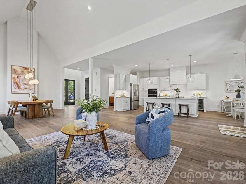 4609 Firethorn Court, Denver, NC 28037.  MLS# CAR4358984, YatesRealty ID 29951. Spacious great room featuring soaring ceilings, abundant natural light, and an open layout that creates an inviting space for relaxing and entertaining.