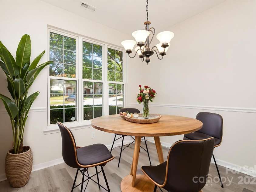 8390 Chaceview Court, Charlotte, NC 28269.  MLS# CAR4283871, YatesRealty ID 29962. Dining area *Virtually staged*