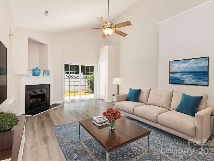 8390 Chaceview Court, Charlotte, NC 28269.  MLS# CAR4283871, YatesRealty ID 29962. Living Room *Virtually staged*