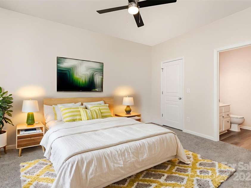 8390 Chaceview Court, Charlotte, NC 28269.  MLS# CAR4283871, YatesRealty ID 29962. Primary Bedroom on main *Virtually staged*