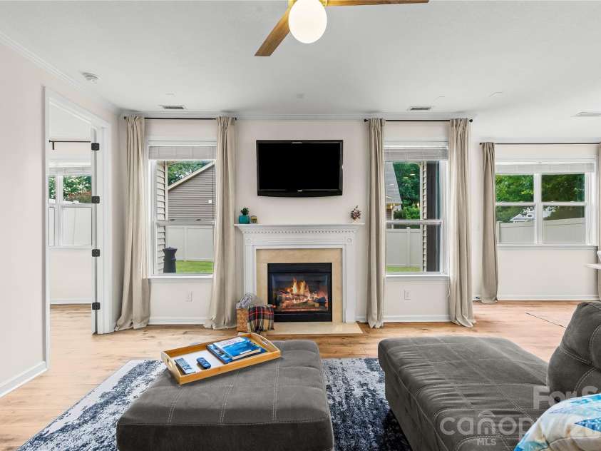 7202 Toxaway Lane, Charlotte, NC 28269.  MLS# CAR4389424, YatesRealty ID 29966. Updated fan with dimmable light