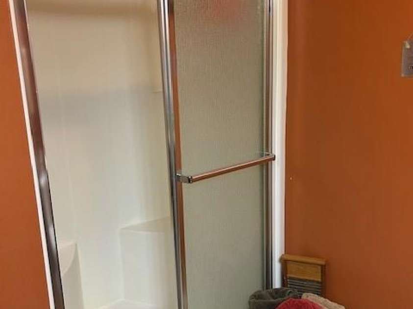 116 Minerva Lane, Sapphire, NC 28774.  MLS# CAR4237813, YatesRealty ID 2997. Guest bathroom