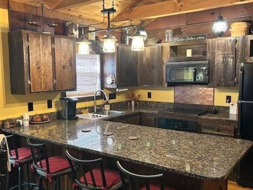 116 Minerva Lane, Sapphire, NC 28774.  MLS# CAR4237813, YatesRealty ID 2997. Kitchen with breakfast bar