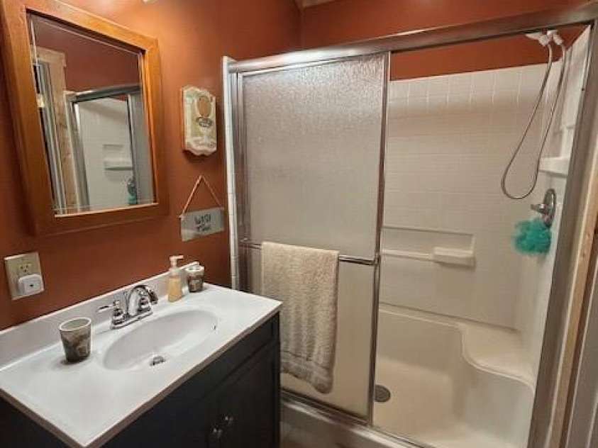 116 Minerva Lane, Sapphire, NC 28774.  MLS# CAR4237813, YatesRealty ID 2997. Primary bathroom