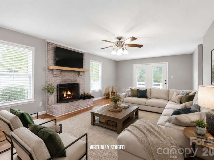 4548 Tree Haven Court, Gastonia, NC 28056.  MLS# CAR4391571, YatesRealty ID 29974. Virtually staged living room.