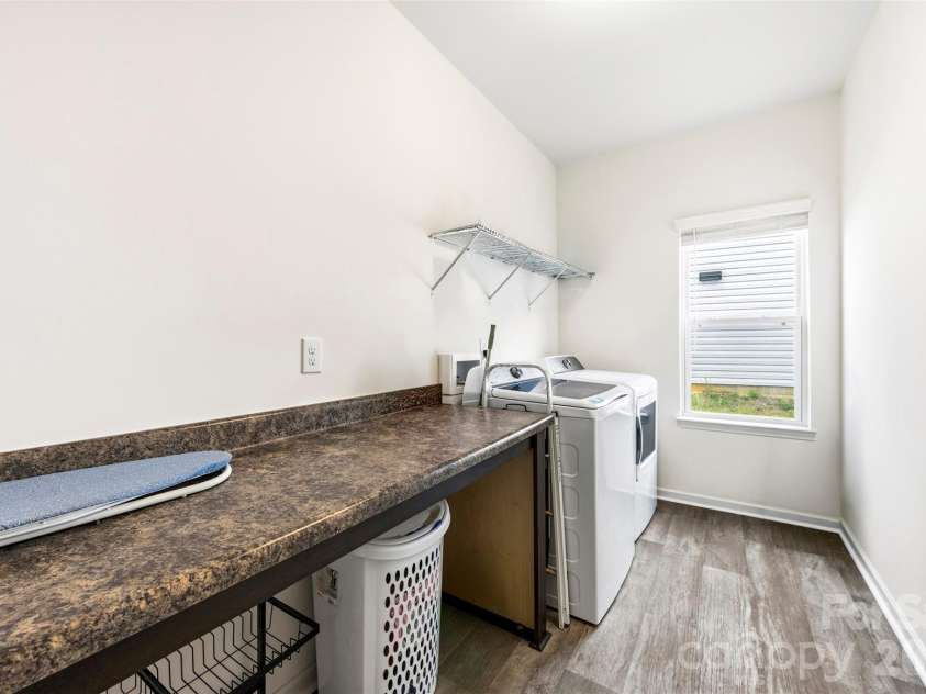3009 Pinehills Way, Mount Holly, NC 28120.  MLS# CAR4388074, YatesRealty ID 29975. Laundry room