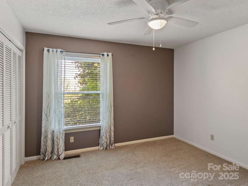 6 Wilderness Cove Road, Asheville, NC 28804.  MLS# CAR4274846, YatesRealty ID 29979. 2nd Bedroom -facing the front-