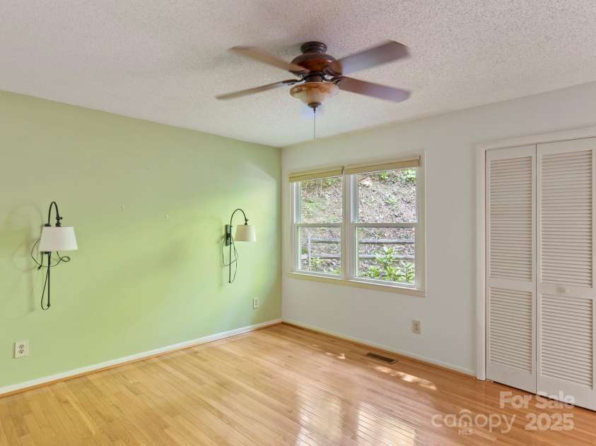 6 Wilderness Cove Road, Asheville, NC 28804.  MLS# CAR4274846, YatesRealty ID 29979. Primary bedroom