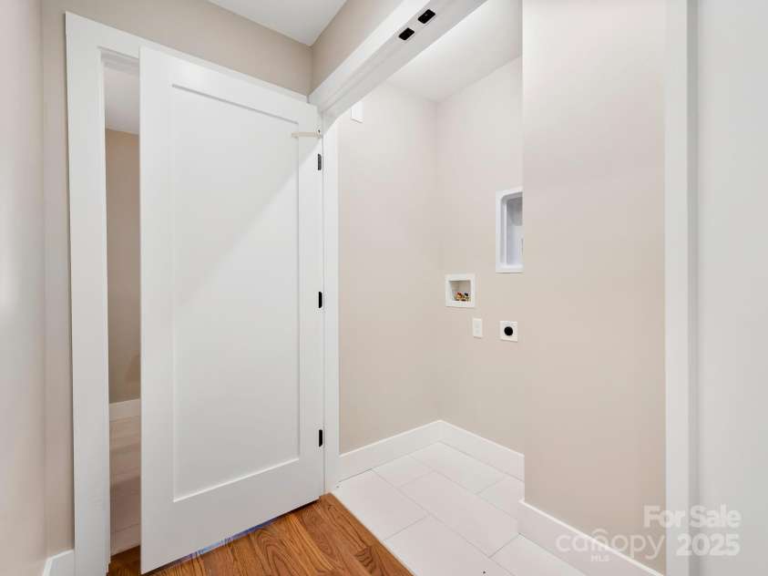 15 Perdue Place, Asheville, NC 28806.  MLS# CAR4316954, YatesRealty ID 2998. Hallway laundry
