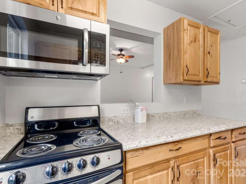 100 Brookstone Drive, Mount Holly, NC 28120.  MLS# CAR4256317, YatesRealty ID 29985. Apartment Kitchen