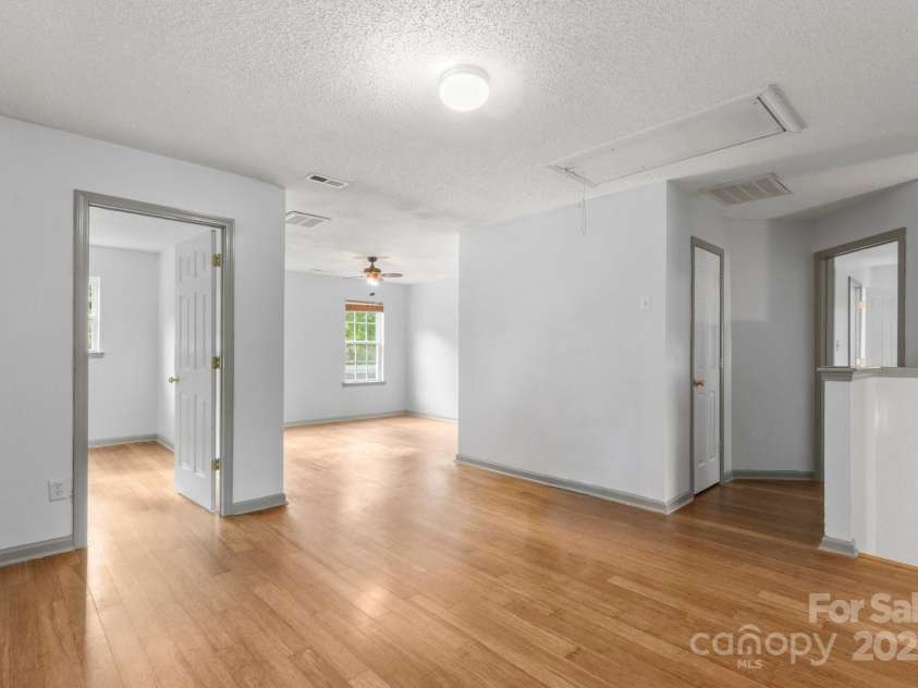 100 Brookstone Drive, Mount Holly, NC 28120.  MLS# CAR4256317, YatesRealty ID 29985. Upstairs Loft/Bonus Rm