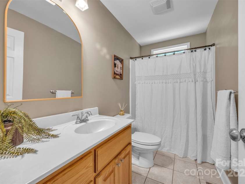 288 Grapevine Circle, Taylorsville, NC 28681.  MLS# CAR4276575, YatesRealty ID 29989. Guest Bathroom