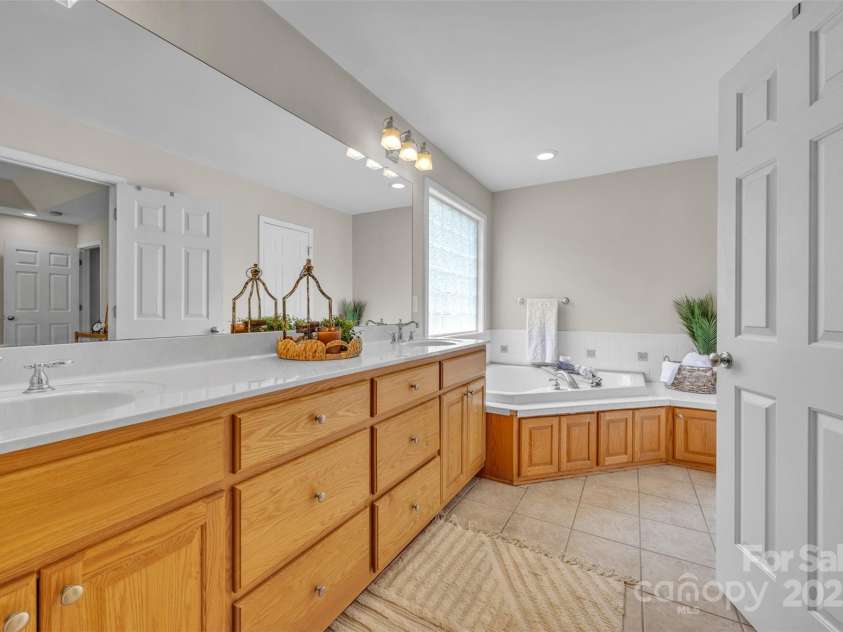 288 Grapevine Circle, Taylorsville, NC 28681.  MLS# CAR4276575, YatesRealty ID 29989. Primary bathroom