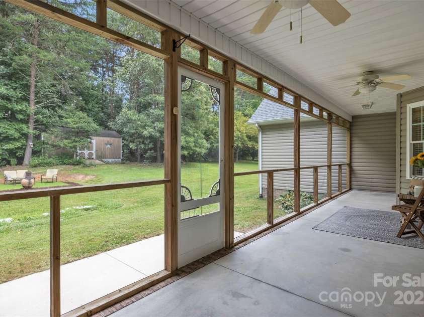 288 Grapevine Circle, Taylorsville, NC 28681.  MLS# CAR4276575, YatesRealty ID 29989. Screened in back porch