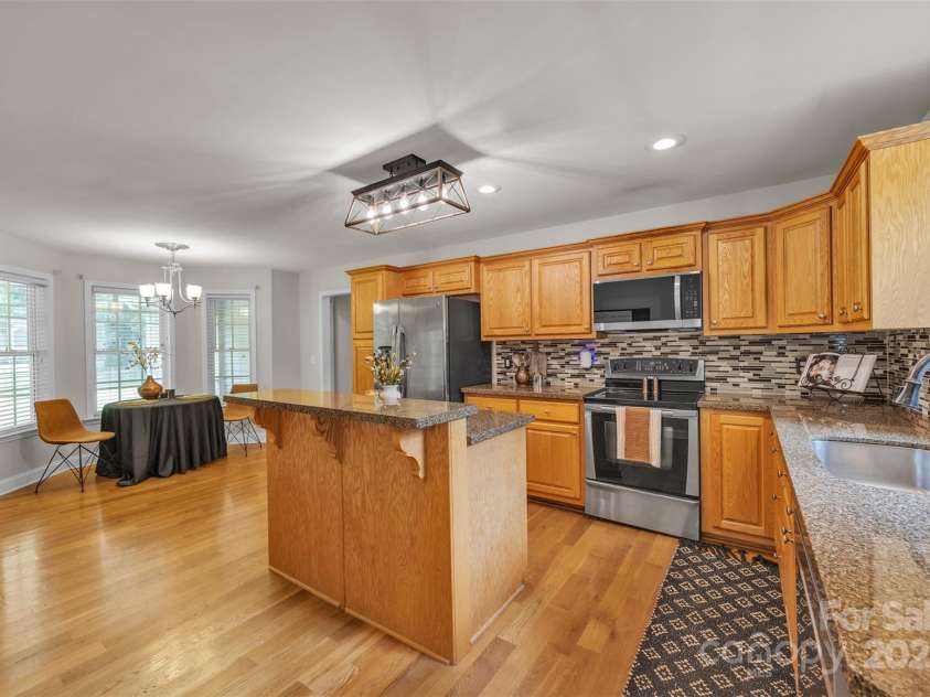 288 Grapevine Circle, Taylorsville, NC 28681.  MLS# CAR4276575, YatesRealty ID 29989. Spacious kitchen with breakfast area & island