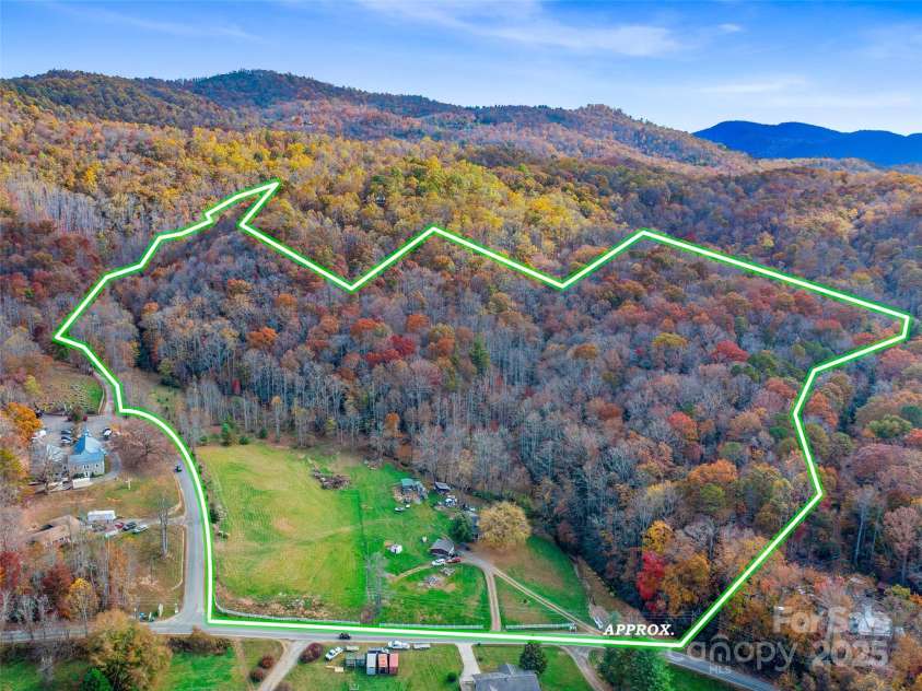 384 Flat Creek Road, Fairview, NC 28730.  MLS# CAR4240696, YatesRealty ID 2999. Drone view in the fall.