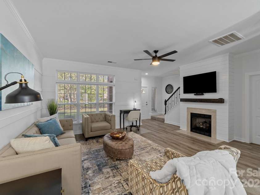 929 Central Park Circle, Davidson, NC 28036.  MLS# CAR4283985, YatesRealty ID 29992. Bright living room with custom millwork