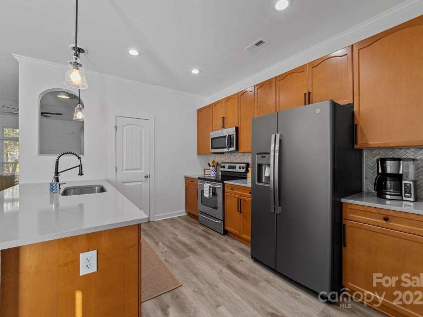 929 Central Park Circle, Davidson, NC 28036.  MLS# CAR4283985, YatesRealty ID 29992. Galley style kitchen with pantry