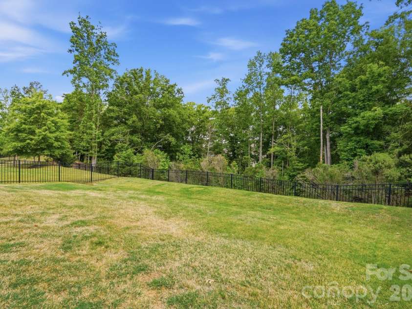 5032 Lydney Circle, Waxhaw, NC 28173.  MLS# CAR4371044, YatesRealty ID 29994. Backyard view