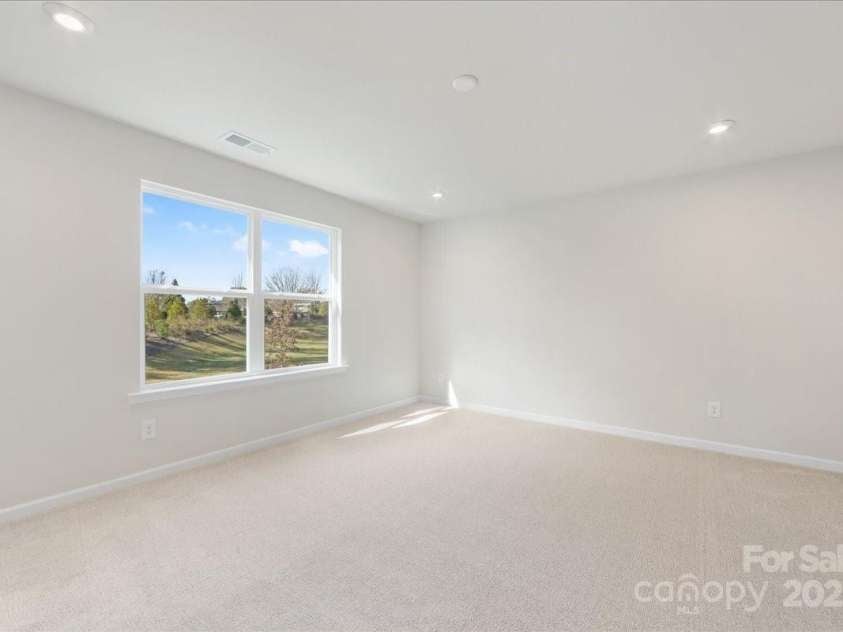 8237 Franklin Trail Street, Mint Hill, NC 28227.  MLS# CAR4318996, YatesRealty ID 29996. Primary Suite Facing Unobstructed Views and Mature Trees.