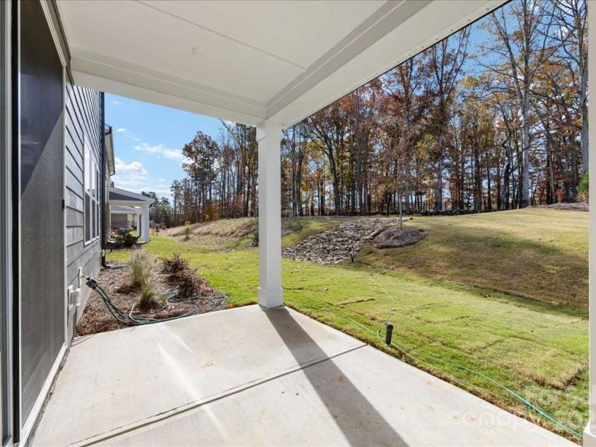 8237 Franklin Trail Street, Mint Hill, NC 28227.  MLS# CAR4318996, YatesRealty ID 29996. Rear Covered Outdoor Living.