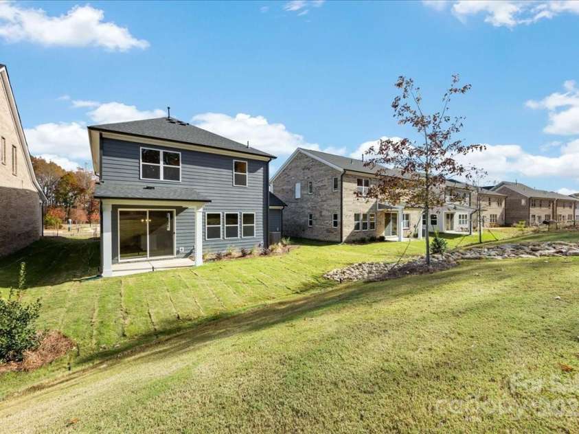 8237 Franklin Trail Street, Mint Hill, NC 28227.  MLS# CAR4318996, YatesRealty ID 29996. Rear Exterior Facing Tree-Lined Views.