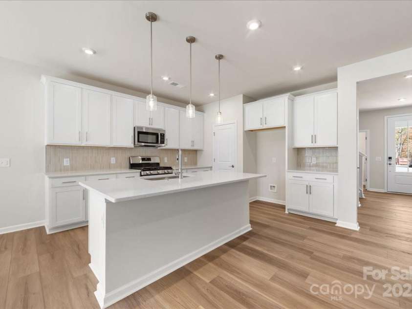 8237 Franklin Trail Street, Mint Hill, NC 28227.  MLS# CAR4331815, YatesRealty ID 29996. Convenient Storage and Quartz Countertops.