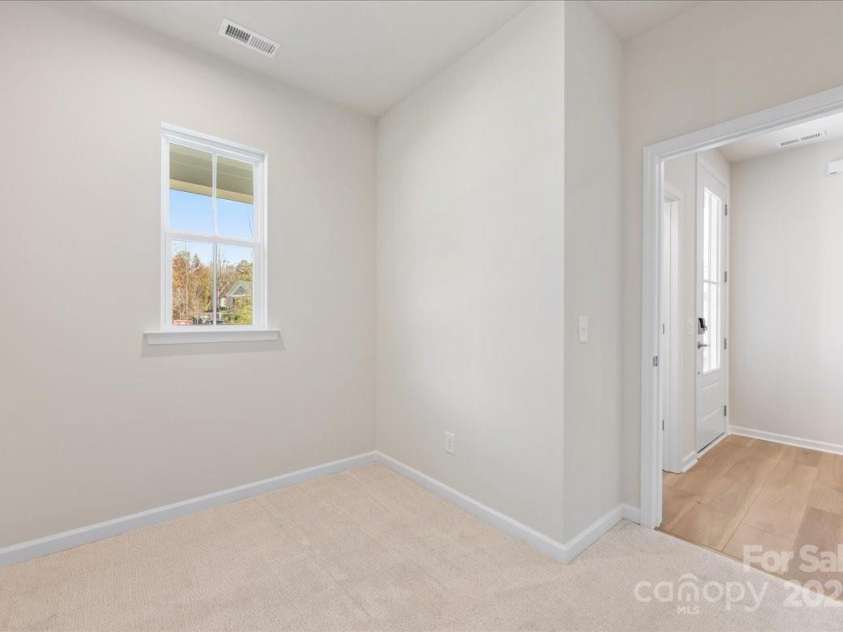 8237 Franklin Trail Street, Mint Hill, NC 28227.  MLS# CAR4331815, YatesRealty ID 29996. First Floor Flex Space Through Glass Paned Door.