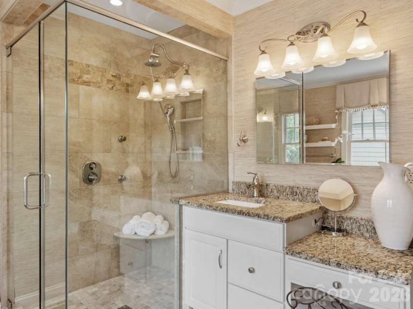 6 Creekside Way, Asheville, NC 28804.  MLS# CAR4379945, YatesRealty ID 29998. Primary Bath and updated shower.