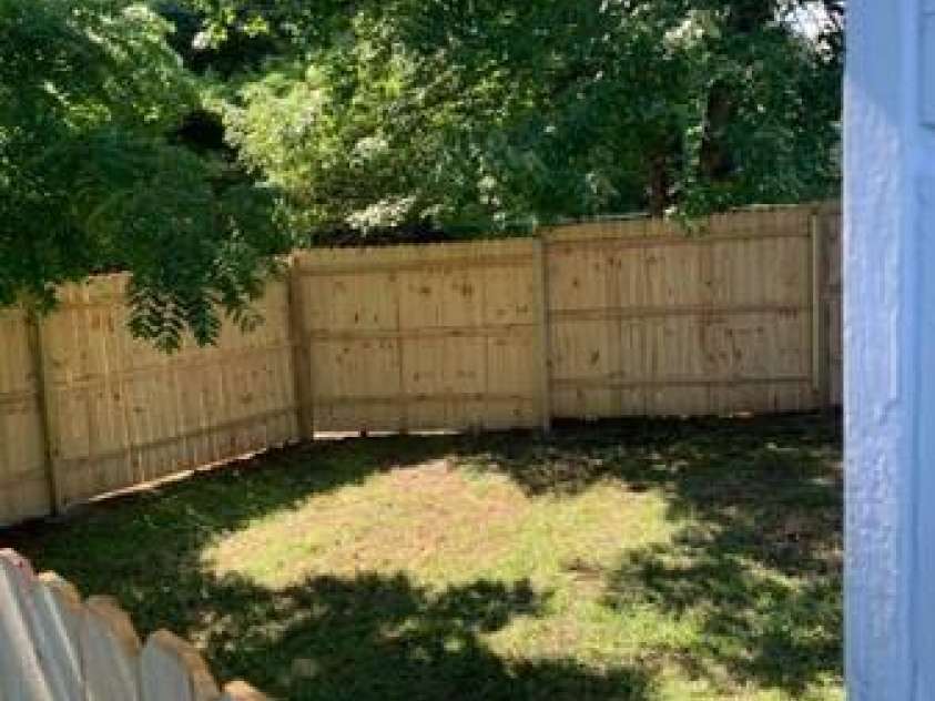 450 Davis Street, Albemarle, NC 28001.  MLS# CAR3924741, YatesRealty ID 30. 420 Davis St fence