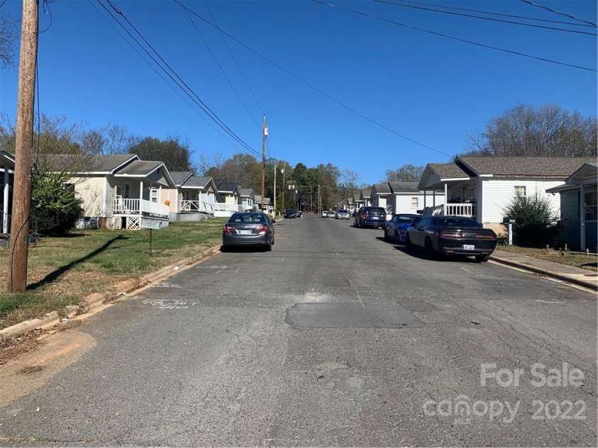 450 Davis Street, Albemarle, NC 28001.  MLS# CAR3924741, YatesRealty ID 30. Davis Street right and left side