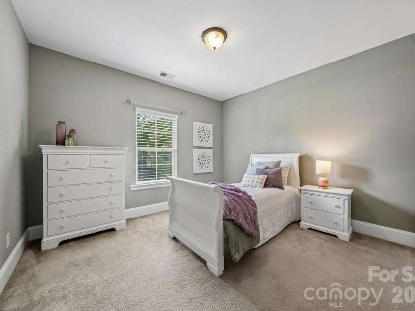 7111 Yellowhorn Trail, Waxhaw, NC 28173.  MLS# CAR4383370, YatesRealty ID 30000. Secondary bedroom 2 with private bath
