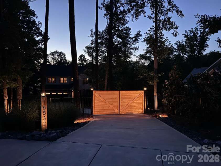 16532 Here At Last Lane, Charlotte, NC 28278.  MLS# CAR4383524, YatesRealty ID 30002. Home is completely fenced and gated