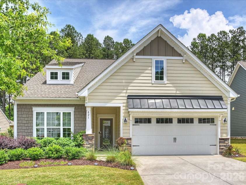 821 Botticelli Court, Mount Holly, NC 28120.  MLS# CAR4385739, YatesRealty ID 30004. Front Elevation with Two-Car Garage
