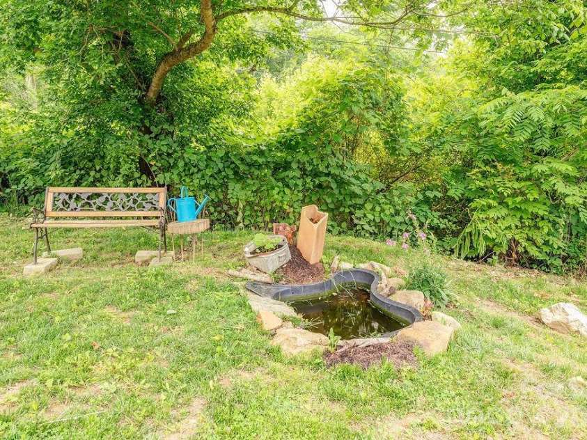 153 Vinewood Circle, Asheville, NC 28806.  MLS# CAR4374237, YatesRealty ID 30012. Backyard