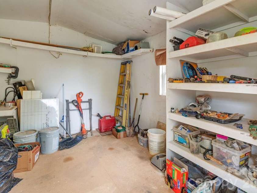 153 Vinewood Circle, Asheville, NC 28806.  MLS# CAR4374237, YatesRealty ID 30012. Inside storage shed