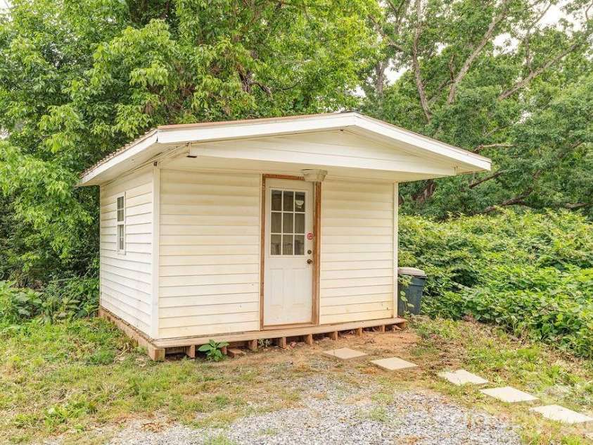 153 Vinewood Circle, Asheville, NC 28806.  MLS# CAR4374237, YatesRealty ID 30012. Storage shed