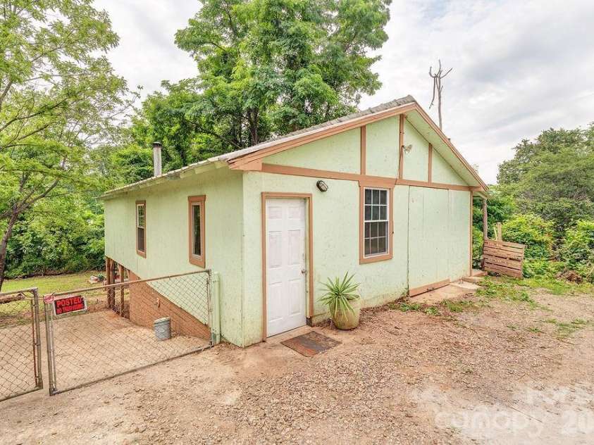 153 Vinewood Circle, Asheville, NC 28806.  MLS# CAR4374237, YatesRealty ID 30012. Workshop from street