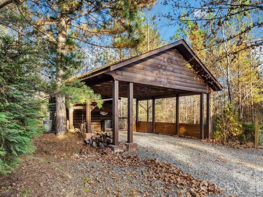 317 Chocolate Drop Circle, Union Mills, NC 28167.  MLS# CAR4337126, YatesRealty ID 3002. Carport and storage