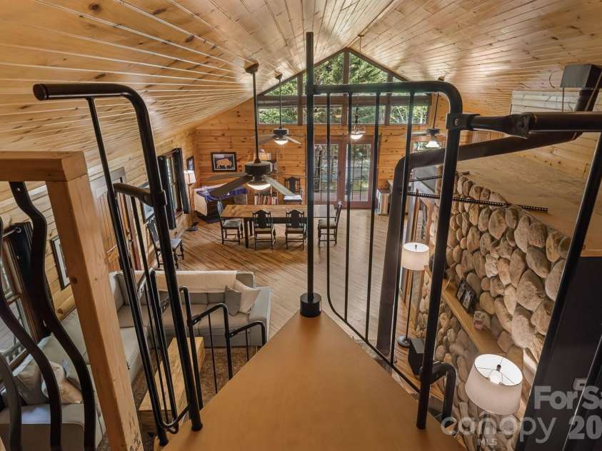 317 Chocolate Drop Circle, Union Mills, NC 28167.  MLS# CAR4337126, YatesRealty ID 3002. Spiral staircase to access loft