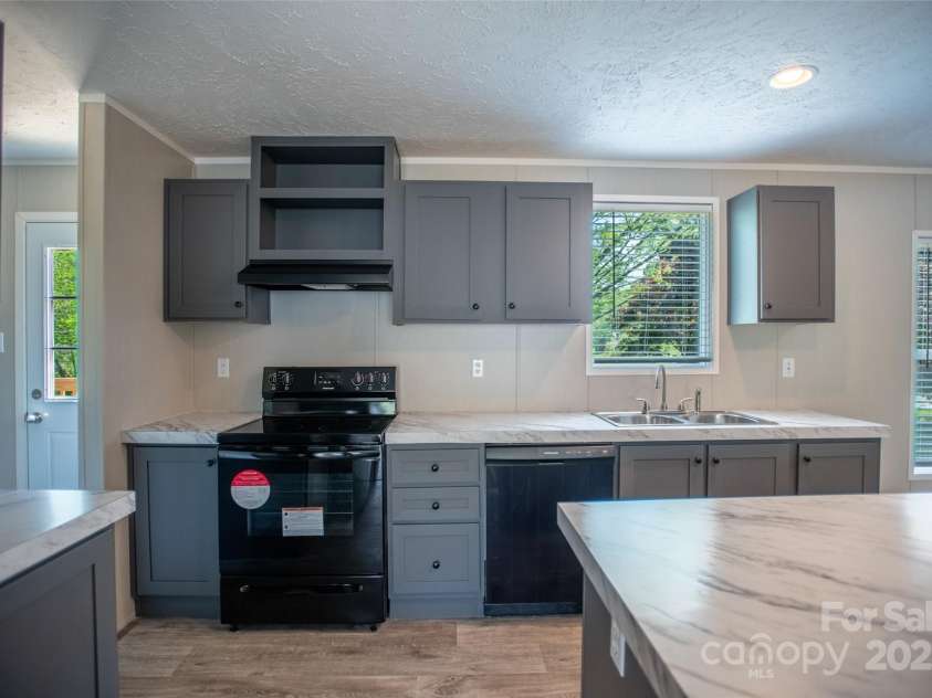 1451 Newfound Road, Leicester, NC 28748.  MLS# CAR4288649, YatesRealty ID 30020. 